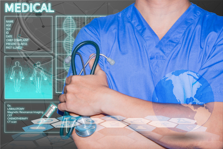 Doctor cross ones arm and hold stethoscope chromosome  background concept healthcareの写真素材