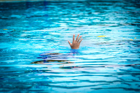 victim drowning show hand ask for help 