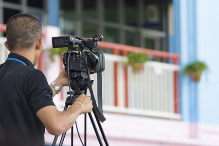man professional operator action video camera technology