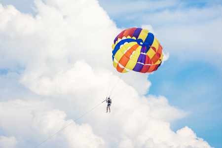 people playing parashoot on the sky summer seasonの写真素材