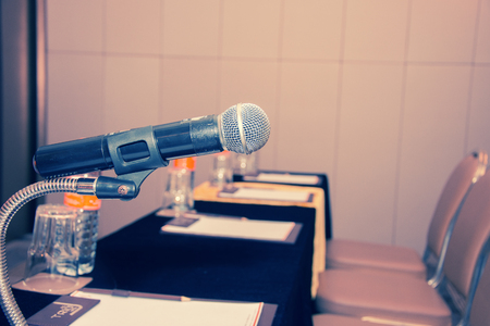 Close-up of retro microphone at meeting roomの写真素材