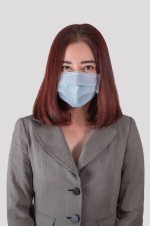 portrait female ware surgical mask prevent virus covid19 add clipping pathの写真素材