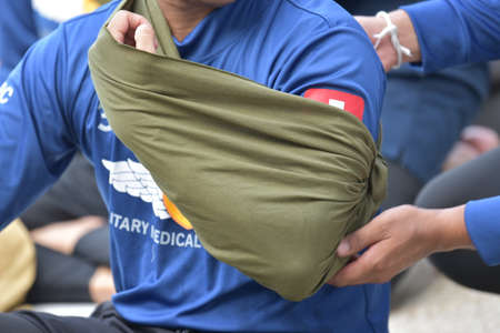 first aid improvise by triangle fabric concept healthcareの写真素材