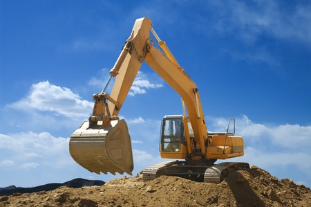 Large-sized excavator in mine workの写真素材