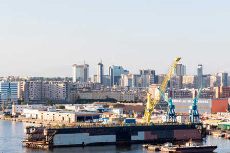 Photograph taken in Naples, Italy, showing a view of the directional center, the harbor, and the cityの写真素材