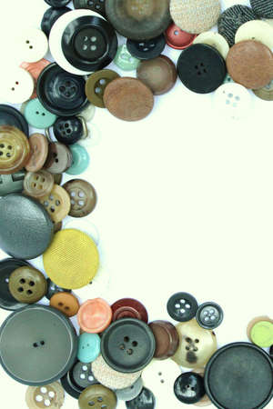 Variation of different size buttons on white background making a frameの写真素材