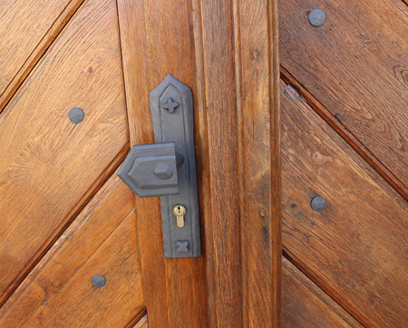 Historical clique of old wooden door Historical clique of old wooden door