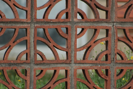 decorated wall of perforated bricksの写真素材