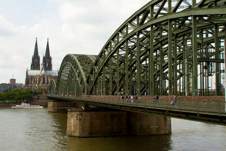 COLOGNE, GERMANY - AUGUST 07, 2014: A view of Hohenzollern Bridge and Cologne Cathedralのeditorial素材
