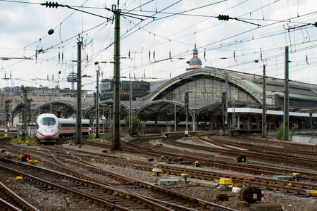 COLOGNE, GERMANY - AUGUST 07, 2014: Central Station's platform with high speed train departingのeditorial素材