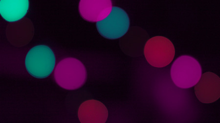 Blurred colored lights. Effect of lights out of focus for designers. Festive lightsの写真素材