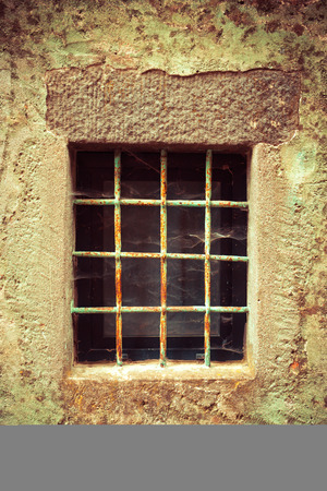 Old window of an old house already obsolete.の写真素材
