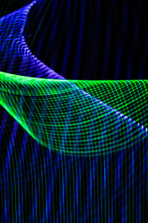 Abstract colorful lines on black background. Patterns of lines forming colorful figures.