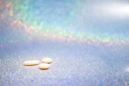 Drug abuse concept. Drugs on colorful background. Party background with colored pills. Drug...