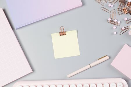 flat lay stationery on work desk in gray pastel background