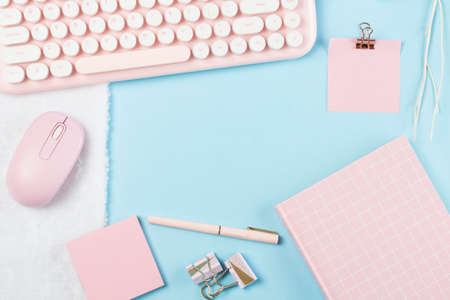 flat lay stationery collocate on work desk in pastel colorful backgroundの写真素材