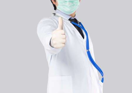 doctor put his hand forward make like symbol and excellentの写真素材