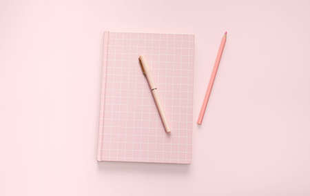 flat lay pink color book and stationeryの写真素材