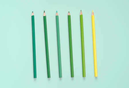 flat lay pen and stationery on green pastel floorの写真素材