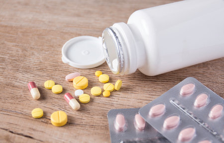 take medicine pills and drug for patient from pharmacy and hospital , close up