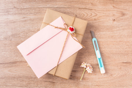 flat lay book and stationery on wooden background
