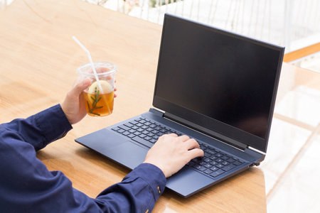Working on laptop , relaxing in cafe , on vacation