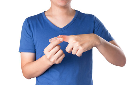 x-ray finger bone pain in white backgroundの写真素材