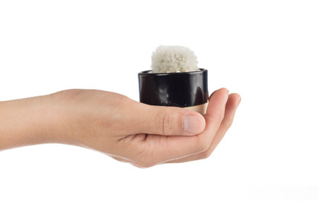 hand holding cactus pot on white backgroundの写真素材