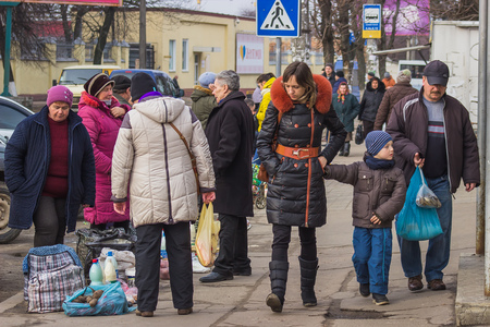 Zhytomyr, Ukraine - February 23, 2016: People walking at milk marketのeditorial素材
