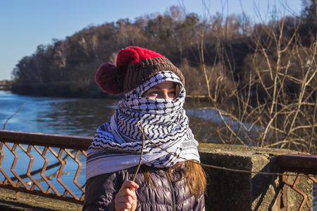 Zhytomyr, Ukraine - February 17, 2016: Girl extremist at river ready for fightのeditorial素材