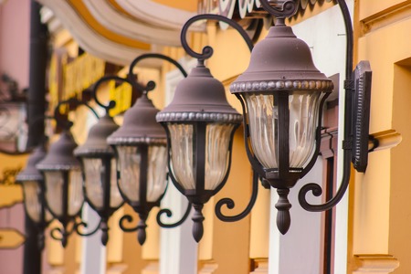 retro lantern in the street at buildingの写真素材