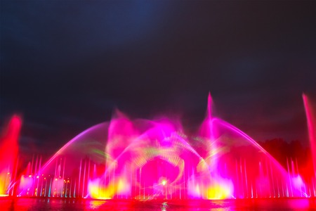 fountain stream in the evening shore riverの写真素材