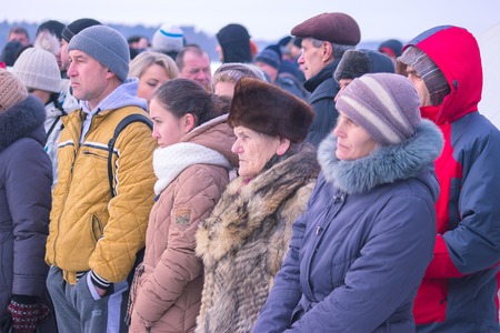 Zhytomyr, Ukraine - January 19, 2016: People celebrating epiphany at winter waterのeditorial素材