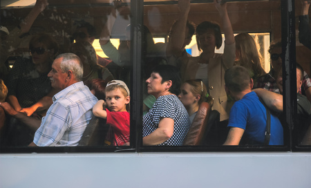 Zhytomyr, Ukraine - September 10, 2014: Large group of angry People going by busのeditorial素材