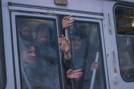 Zhytomyr, Ukraine - September 10, 2014: Large group of angry People going by busのeditorial素材