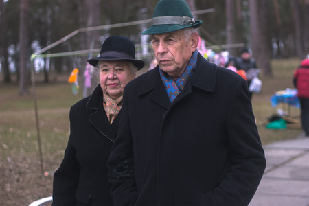 Zhytomyr, Ukraine - October 03, 2015: old couple of man and woman walking in the parkのeditorial素材