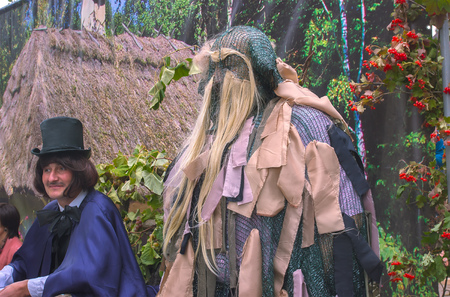 Korosten, Ukraine - September 06, 2016: actors in the form of writer Nikolai Gogol and the beast during Potato pancake Fair in Korosten, Ukraineのeditorial素材