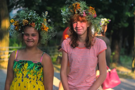 Zhytomyr, Ukraine - July 12, 2016: Close up two Sensual girls with Fresh flowers at headのeditorial素材