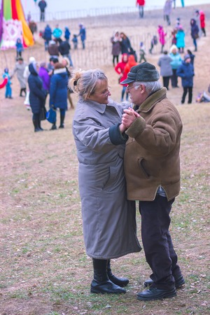 Zhytomyr, Ukraine - October 03, 2015: old couple man and woman dancing in the park beachのeditorial素材