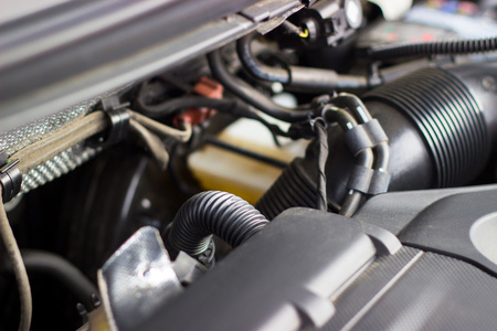 what looks like a car engine system under the hood