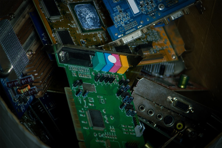 box with old unnecessary electronic circuit boards