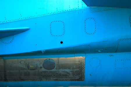 vintage old blue plane at dusk with a shiny coating
