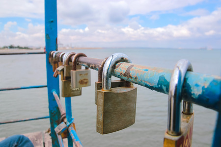 Love locks in front of the sea