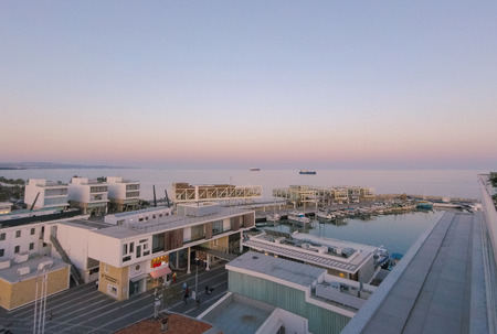 Sunset over Harbour with ships rooftop viewの写真素材