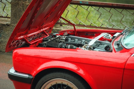 Car crash open hood car mechanic to check condition of damage. See the radiator cooling panel Engine...