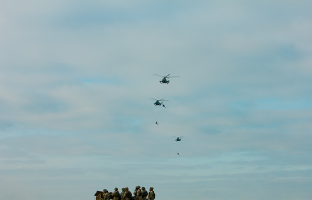 Military Army paratroopers display at air show festival.