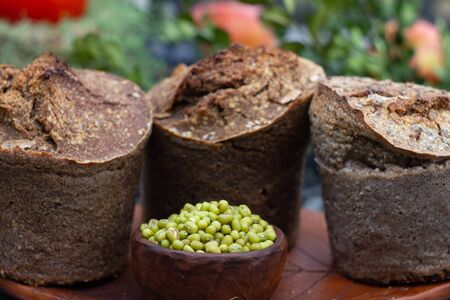 Wheat bread. Buckwheat bread at bush background