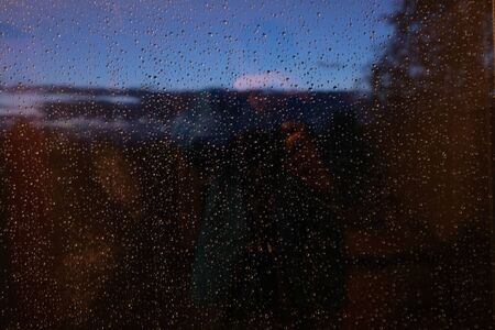 wet window after rainfall in the evening