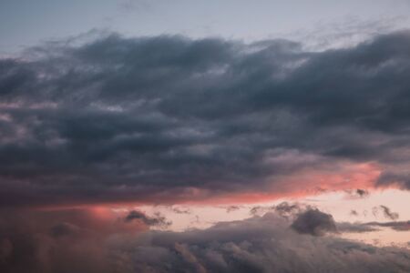 dark gray storm clouds after the rain textureの写真素材