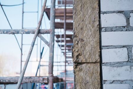 Old brick building is under reconstruction for modern office spaces.の写真素材